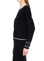 Maglione donna Liu Jo better nero/bianco latte E26LJ25 TF5210 MS49I 03N66
